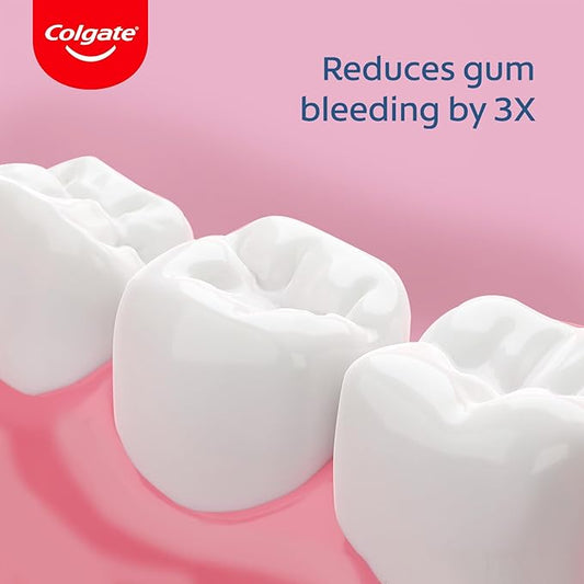 Colgate toothpaste with teeth and text on a pink background