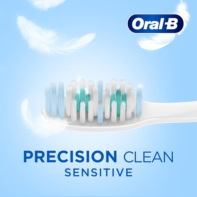 Oral-B Precision Clean Sensitive toothbrush on a light blue background