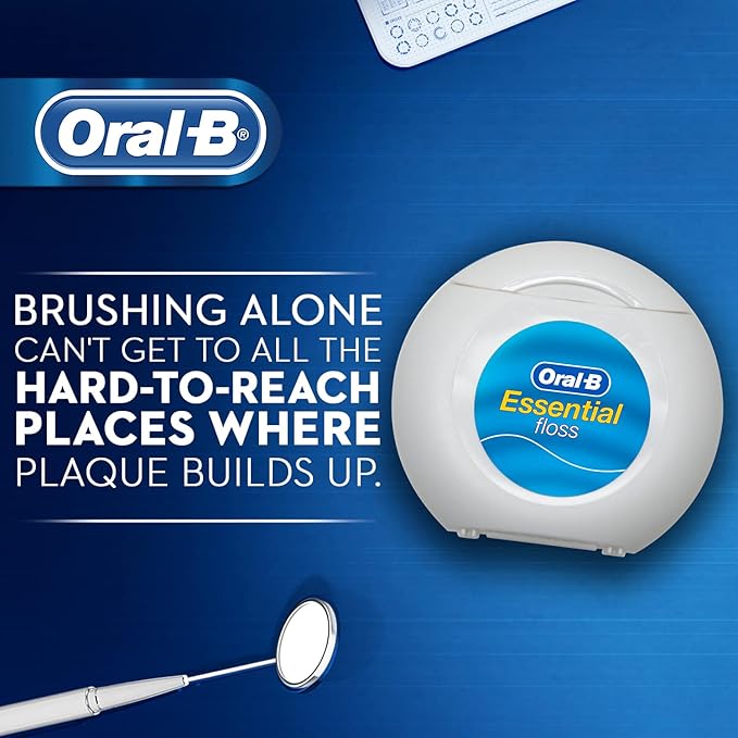 Oral-B dental floss container with text on a blue background