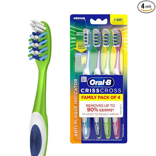Oral-B CrissCross toothbrushes with packaging on a white background